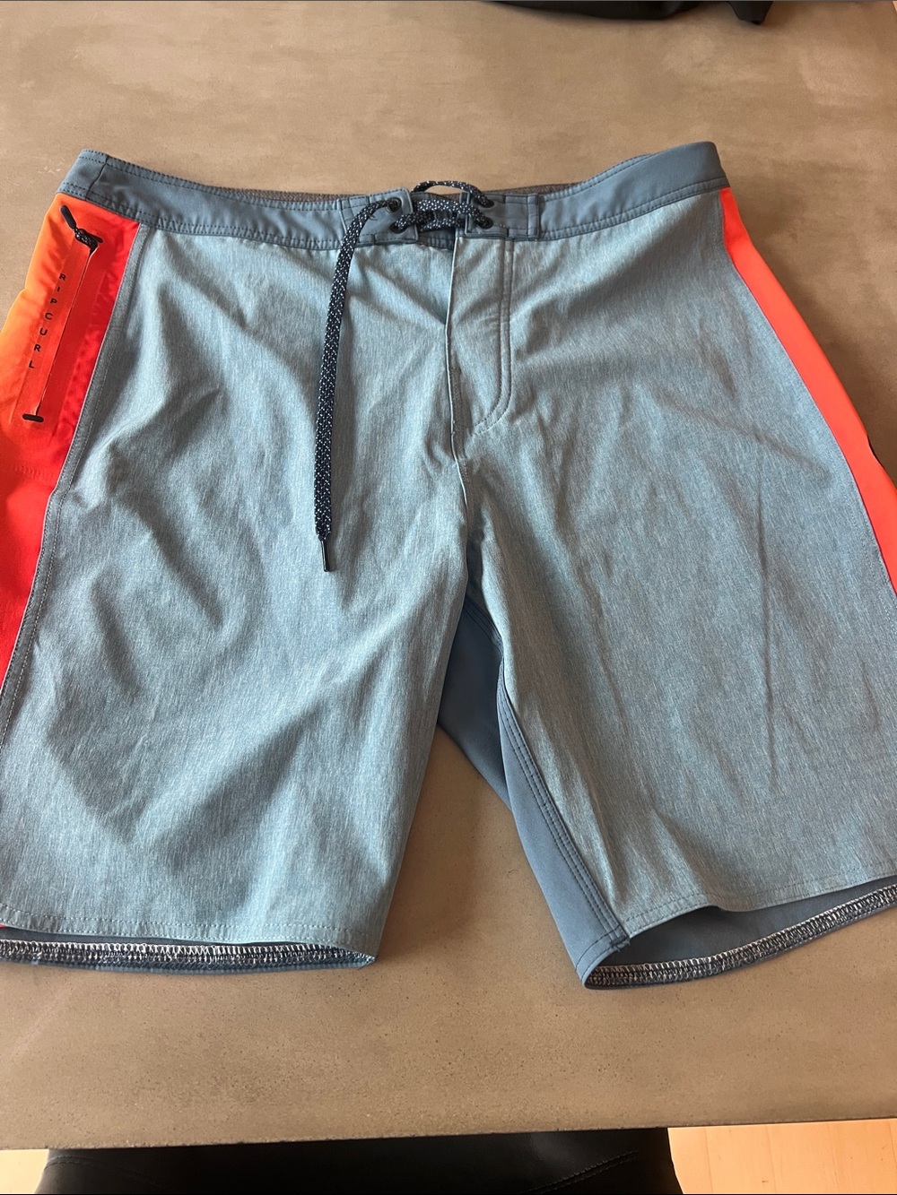 Rip Curl Light Blue Board Shorts with Neon Orange Side Panels
